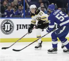  ?? ASSOCIATED PRESS ?? UNHAPPY RETURNS: Charlie McAvoy was back in the lineup last night, but the Bruins fell short against the Lightning, 3-2, in Tampa.