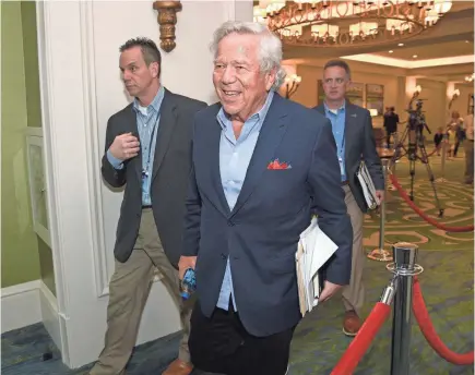  ?? PHELAN EBENHACK/AP ?? Patriots owner Bob Kraft, foreground, says, “I have a big problem with what’s going on in Washington and the divisivene­ss, and no one’s listening to one another. ... Something’s not right, and we’ve got to fix it.”