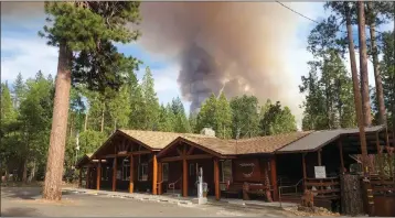  ?? COURTESY PHOTO ?? View outside of the Redwoods in Yosemite shows a vacation home community 1.5miles from the blaze on Friday.