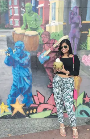  ?? MANISHA KHATTA/SHRUTI SHAH FILES ?? What a profile! Shruti Shah is shown in front of a street mural in Washington, D.C. Shah has used this pic as a dating profile image.