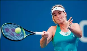  ?? AFP ?? CoCo Vandeweghe of the US returns a shot against Lucie Safarova. —