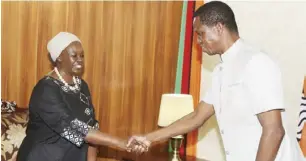  ??  ?? President Edgar Lungu talks to out-going Zimbabwean Ambassador to Zambia Ms Getrude Takawira when she paid a courtesy call at State House yesterday.