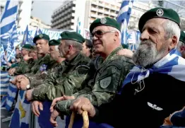  ?? — AP ?? Greek Army veterans attend a rally in Athens on Sunday. Protesters gather in the capital for a massive rally to protest a potential Greek compromise in a dispute with neighbouri­ng Macedonia over the former Yugoslav republic’s official name.