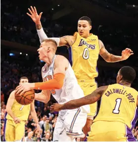  ?? (AP PHOTO/ ANDRES KUDACKI) ?? CLUTCH NUMBERS. New York Knicks’ Kristaps Porzingis had 37 points and 11 rebounds in their overtime win over the Lakers.