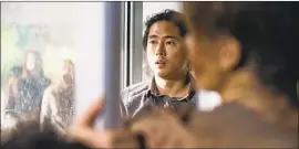  ?? Gene Page AMC ?? YEUN’S “WALKING DEAD” character, Glenn Rhee, survived for six seasons.