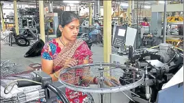  ?? HT PHOTO ?? A worker at a cycle factory in Ludhiana. Punjab did not figure among top five states in any of the 12 reform areas.