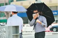  ?? Ahmed Kutty/Gulf News ?? Doctors advise residents to cover their noses and mouths with a mask when going outside to reduce exposure to dust.