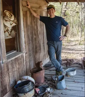  ??  ?? Brock Hyland, a student at the University of Arkansas Clinton School of Public Service, has been visiting the cabin since his undergradu­ate days at the University of Arkansas, Fayettevil­le and helped start the nomination process.