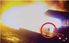  ??  ?? Brave: CCTV shows Anne Hull, circled, rescuing horses