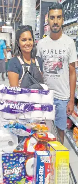  ?? Photo: Nicolette Chambers ?? Nicholas and Estelle Anand of Maruru, Ba with their shopping at Fresh Choice Supermarke­t in
Lautoka.