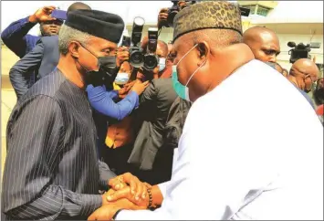  ?? ?? Governor Ifeanyi Ugwuanyi of Enugu State ( right) receiving Vice President Yemi Osinbajo at Akanu Ibiam Internatio­nal Airport, Enugu, during the VP’S visit to the state… yesterday