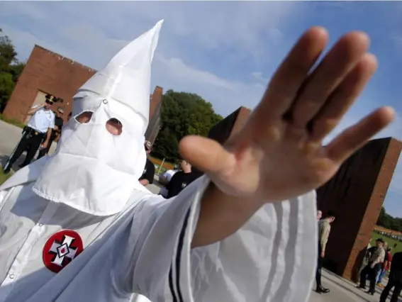 ??  ?? The paper’s editorial said the white supremacis­t group should ‘clean out DC’ (Getty)