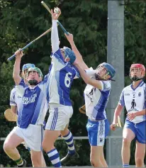  ??  ?? Jack O’Leary (OLI/St. Fintan’s) beats Eamonn Doran to the ball.