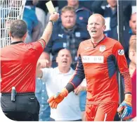  ??  ?? St Mirren keeper Craig Samson is yellow-carded.