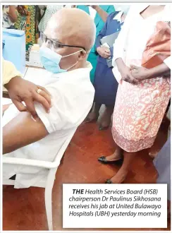  ??  ?? THE Health Services Board (HSB) chairperso­n Dr Paulinus Sikhosana receives his jab at United Bulawayo Hospitals (UBH) yesterday morning