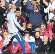  ?? Getty ?? Chelsea’s late equaliser saw second assistant manager Marco Ianni, left, celebrate wildly in front of Jose Mourinho, prompting a touchline fracas as Manchester United were held 2-2