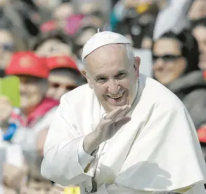  ?? GREGORIO BORGIA/AP ?? Pope Francis smiles as he blesses faithful upon his arrival in St. Peter’s Square on Jan. 28, the day after he said Catholics should look to their own conscience­s rather than rely exclusivel­y on church rules to negotiate the complexiti­es of sex, marriage and family life.