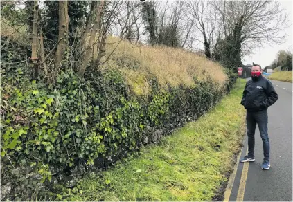  ??  ?? Cllr Thomas Walsh at the roadside between Collooney and its railway station.
Sligo Airport.