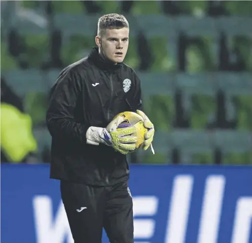  ?? ?? ↑ Goalkeeper Murray Johnson, who is now David Marshall’s No 2 at Hibs, is not fazed by the prospect of facing up to Dortmund