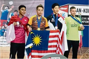  ??  ?? Undisputed: Cheah Liek Hou (second from left) posing with (from left) silver medallist Suryo Nugroho of Indonesia and bronze medallists Taiyo Imai of Japan and Bartlomiej Mroz of Poland at the Dongchun Gymnasium in Ulsan, South Korea, yesterday.