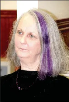  ?? LYNN KUTTER ENTERPRISE-LEADER ?? Local author Pamela Foster with her signature purple streak in her hair.