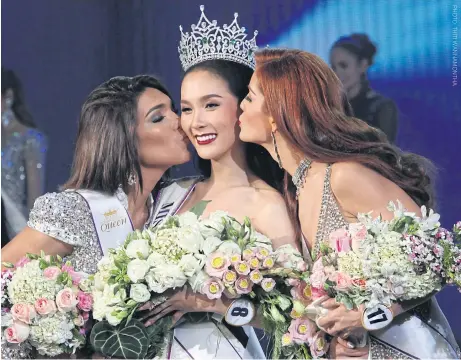  ??  ?? Jiratchaya, centre, with Miss Internatio­nal Queen 2016 runners-up Andrea Collazo from Venezuela, left, and Nathalie de Oliveira from Brazil.