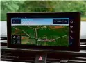  ??  ?? TECHNOLOGY Biggest change inside refreshed A5 is addition of new 10.1-inch digital display. This is touchscree­n-only, which means there is no longer a control wheel on the centre console (left)