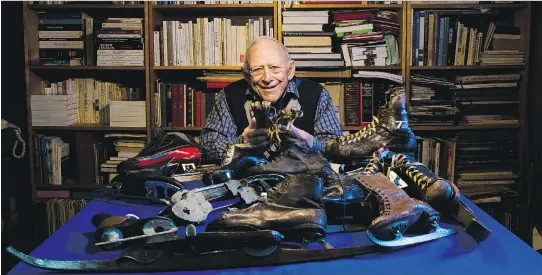  ?? DARREN BROWN ?? Jean-Marie Leduc with a few of his more than 350 ice skates at his home. He is holding a pair of bison bone blades dating back up to 15,000 years.