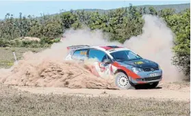  ?? Picture: DARRYL KUKARD/MOTOR MOUTH ?? BITING THE DUST: Rally winners Clyde Challenor and Grayham Bishop negotiate the Spidersweb stage of the race