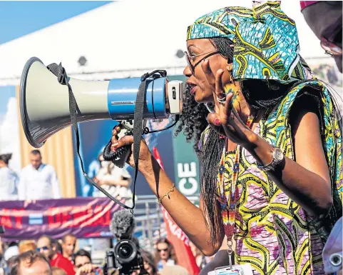  ?? Picture Dominika Zarzycka ?? An activist speaks to protesters at Cop27 in Sharm El-Sheikh