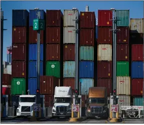  ?? (AP/Jae C. Hong) ?? Containers are stacked at the Port of Long Beach in Long Beach in Calif. in October. U.S. manufactur­ing growth slowed last month amid growing headaches from supply chain bottleneck­s.