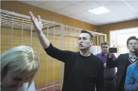  ?? Denis Tyrin / Associated Press ?? Alexei Navalny, who organized protests across Russia, speaks in the Moscow court where he was sentenced to 15 days in jail for resisting police orders.