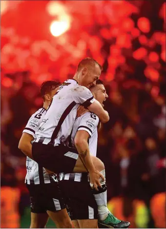  ??  ?? Patrick McEleney (right) and Chris Shields of Dundalk celebrate at the final whistle.