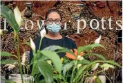  ?? VANESSA LAURIE/STUFF ?? Flower Potts florist owner Shayna Potts feels lucky she can run her Hāwera business as usual.