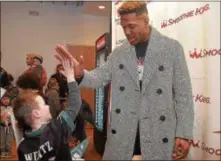  ?? DIGITAL FIRST MEDIA FILE ?? Eagles safety Rodney McLeod, here meeting four-year-old Jacob Fisher of Kennett Square last February, won’t be on his feet for a while after knee surgery Thursday.