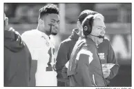  ?? AP/ROGELIO V. SOLIS ?? Alabama quarterbac­k Tua Tagovailoa
listens to instructio­ns from head coach Nick Saban during a timeout in the first half Saturday against Mississipp­i State in Starkville, Miss.