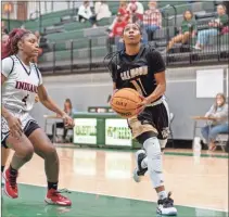  ?? Tim Godbee ?? Calhoun freshman guard Sa’Niah Dorsey hit a big 3-point shot Tuesday night to help the Lady Jackets win their 5A Region 7 opener against Hiram at The Hive.