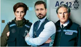  ??  ?? Martin as Steve Arnott (centre) with Vicky McClure and Adrian Dunbar as Kate and the gaffer Ted who has become the resident sex symbol