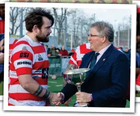  ?? Image: Bryan Robertson ?? The South lift the Inter-District Championsh­ip trophy.