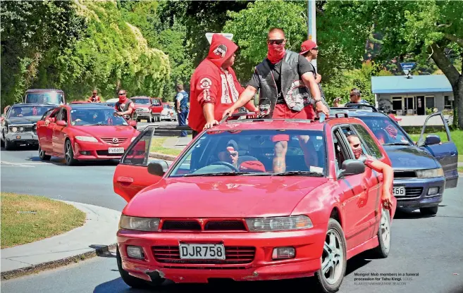  ?? LOUIS KLAASSEN/WHAKATANE BEACON ?? Mongrel Mob members in a funeral procession for Tahu Kingi.