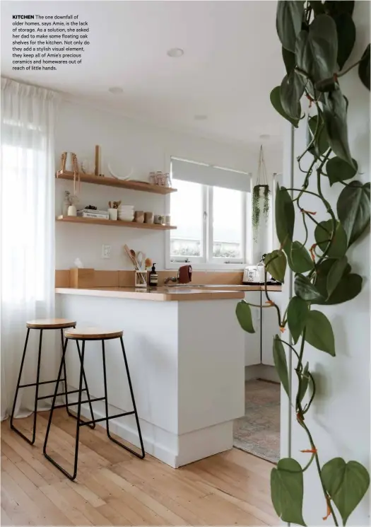  ??  ?? KITCHEN The one downfall of older homes, says Amie, is the lack of storage. As a solution, she asked her dad to make some floating oak shelves for the kitchen. Not only do they add a stylish visual element, they keep all of Amie’s precious ceramics and homewares out of reach of little hands.