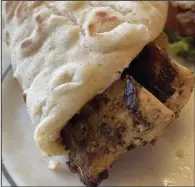  ?? (Arkansas Democrat-Gazette/Kimberly Dishongh) ?? A chicken gyro from Leo’s Greek Castle