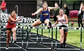  ?? PILOT PHOTO/RON HARAMIA ?? Triton’s Makenna May (middle) is pictured here during the 100 hurdles where she placed fifth. May was second in pole vault earlier in the sectional meet.