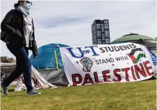  ?? NICK LACHANCE TORONTO STAR ?? Pro-Palestinia­n encampment­s are set up at University of Toronto, left, University of Ottawa, Western University and McMaster University. Ontario’s post-secondary education minister is concerned graduation­s could be hindered by the protests.