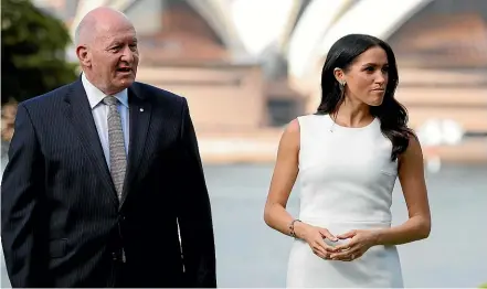  ??  ?? Meghan, Duchess of Sussex, walks with Australia’s Governor General Peter Cosgrove in the gardens at Admiralty House in Sydney.