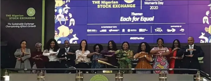  ??  ?? The British Deputy High Commission­er, Ms. Harriet Thompson striking an Each for Equal pose with Company Secretary, MTN Nigeria, Uto Ukpanah; Country Manager, Internatio­nal Finance Corporatio­n Nigeria, Eme Essien, Senior Vice-Chairman, Standard Chartered Bank Group, Bola Adesola, and others at the Nigerian Stock Exchange (NSE) celebratio­n of the 2020 Internatio­nal Women Day