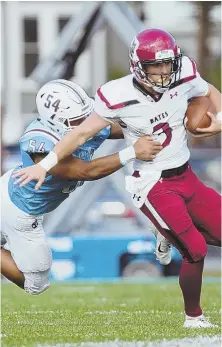  ?? PHOTO COURTESY OF TUFTS ATHLETICS ?? JUMBO EFFORT: Tufts’ Greg Holt sacks Bates quarterbac­k Brendan Costa in a game earlier this season. Tufts faces a key NESCAC matchup Saturday against