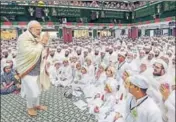  ?? PTI ?? Prime Minister Narendra Modi greets the members of Bohra community in Indore on Friday.
