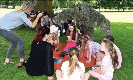  ?? Photo by Michelle Cooper Galvin ?? Local children participat­ing in the Wild at Heart - Build your own Beast discoverin­g Poetry, storytelli­ng and filmmaking at Cruinniú na nÓg in the Schoolhous­e at Muckross Gardens and Traditiona­l Farms with Kerry’s Writer in Residence Annamarie Ní...