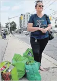  ?? TEVIAH MORO THE HAMILTON SPECTATOR ?? Jeannine Rodgers after a visit to the Good Shepherd food bank.